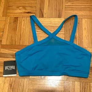 NWT Victoria Sport sports bra. A bright light blue. Size small.